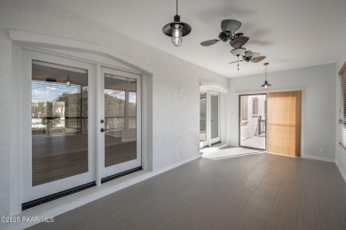 This beautifully remodeled 2-story brick and stucco home blends