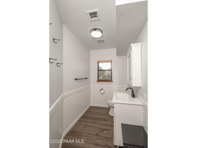 This beautifully remodeled 2-story brick and stucco home blends