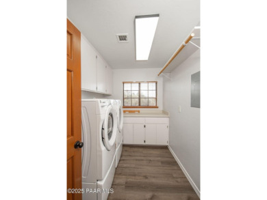 This beautifully remodeled 2-story brick and stucco home blends