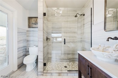 Welcome home to this furnished elevated home only steps from the - photo 29