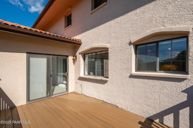 This beautifully remodeled 2-story brick and stucco home blends