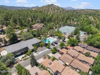 This beautifully remodeled 2-story brick and stucco home blends