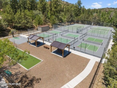 This beautifully remodeled 2-story brick and stucco home blends