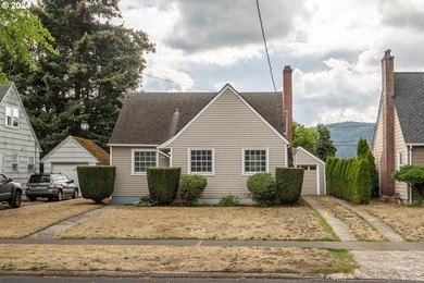 Discover this delightful mid-century Cape Cod located in one of - photo 1
