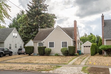 Discover this delightful mid-century Cape Cod located in one of - photo 2