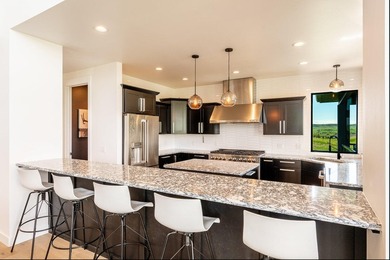 This stunning contemporary home offers the perfect balance of - photo 14