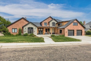 Architecturally striking golf course residence located on the - photo 1