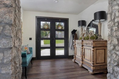 Architecturally striking golf course residence located on the - photo 4
