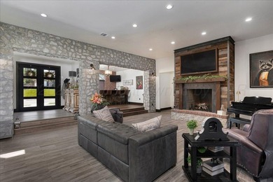 Architecturally striking golf course residence located on the - photo 5