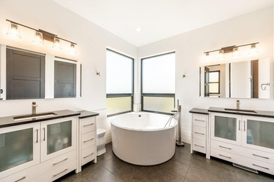 This stunning contemporary home offers the perfect balance of - photo 26