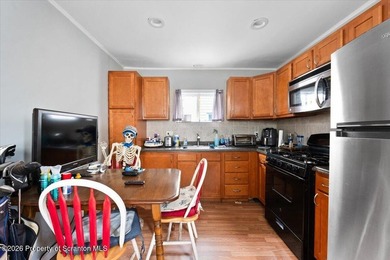 Welcome to 74. W Carey Street, Wilkes-Barre! This charming and - photo 4