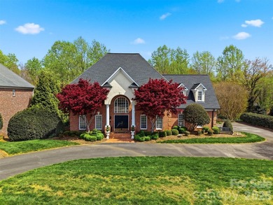 This all-brick luxury residence is nestled in the prestigious - photo 1