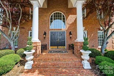 This all-brick luxury residence is nestled in the prestigious - photo 2