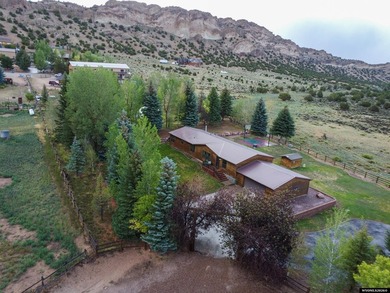 Minutes from Flaming Gorge, this exceptional 2.2-acre property