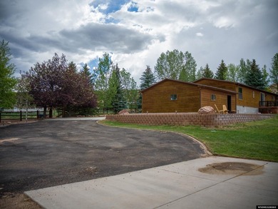 Minutes from Flaming Gorge, this exceptional 2.2-acre property - photo 8