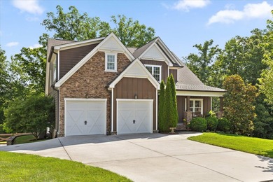 Tucked away on a private, beautifully landscaped lot, this home - photo 1