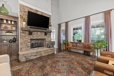Tucked away on a private, beautifully landscaped lot, this home - photo 2