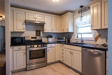 Welcome home to this beautifully maintained 3-bedroom raised - photo 16