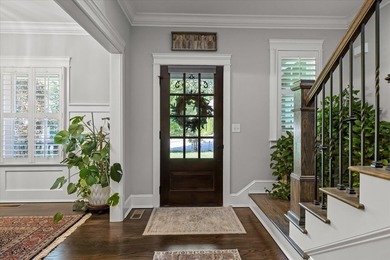 Tucked away on a private, beautifully landscaped lot, this home - photo 8