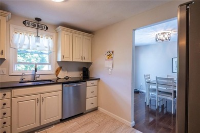 Welcome home to this beautifully maintained 3-bedroom raised - photo 18