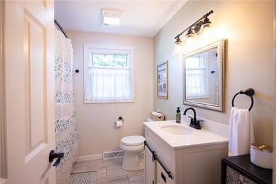 Welcome home to this beautifully maintained 3-bedroom raised - photo 19