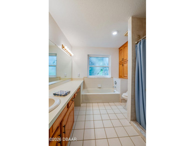Tucked away on a quiet cul-de-sac in the desirable Tomoka Oaks - photo 21