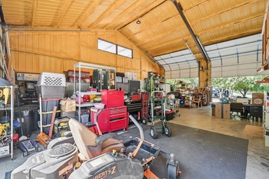 Enjoy wide-open country living with this versatile barndominium - photo 25