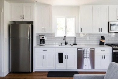 This beautifully updated 1921 Craftsman bungalow blends classic - photo 32