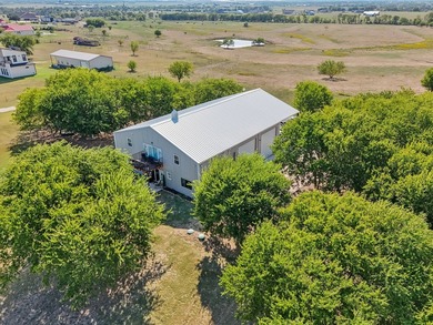 Enjoy wide-open country living with this versatile barndominium - photo 34