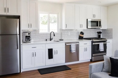 This beautifully updated 1921 Craftsman bungalow blends classic - photo 34