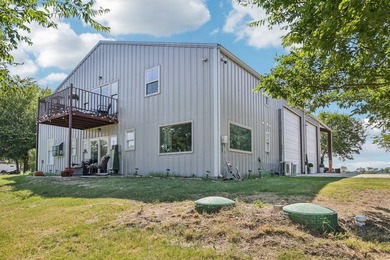 Enjoy wide-open country living with this versatile barndominium - photo 38