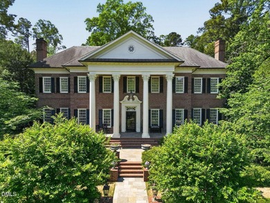 Stately, elegant brick estate set on a 1.57-acre lot along - photo 1