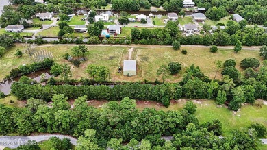 Discover a rare opportunity to own 12.65 acres of waterfront - photo 20
