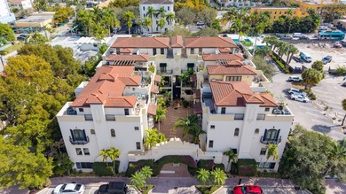 In the heart of vibrant Delray Beach, just steps from iconic