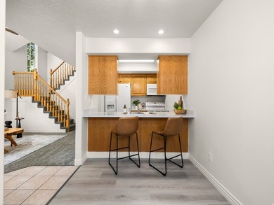 Beautifully updated end-unit townhome tucked away in the quiet - photo 3