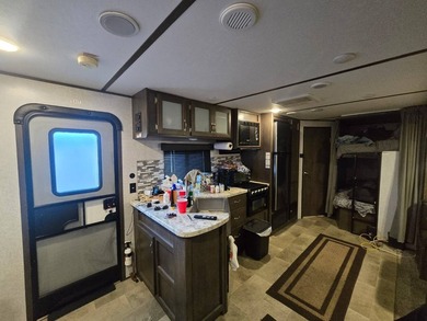 Motivated Seller! Charming 2-bedroom, 1-bath camper with a large - photo 7