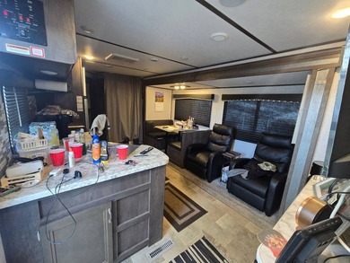 Motivated Seller! Charming 2-bedroom, 1-bath camper with a large - photo 9