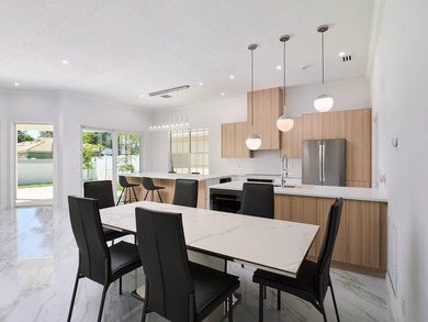 This completely reimagined 3-bedroom, 2-bath residence offers a - photo 6