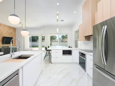 This completely reimagined 3-bedroom, 2-bath residence offers a - photo 10