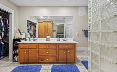 This 3-bed, 2-bath brick home sits on a large corner lot in an - photo 12