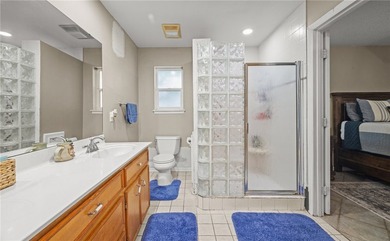 This 3-bed, 2-bath brick home sits on a large corner lot in an - photo 13