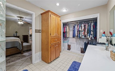 This 3-bed, 2-bath brick home sits on a large corner lot in an - photo 14