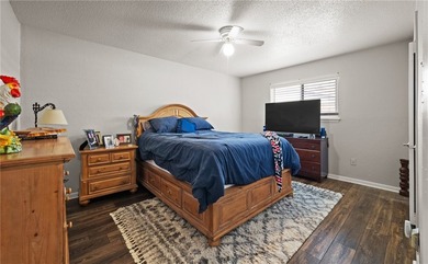 This 3-bed, 2-bath brick home sits on a large corner lot in an - photo 15