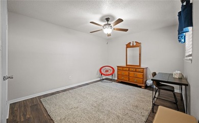 This 3-bed, 2-bath brick home sits on a large corner lot in an - photo 17