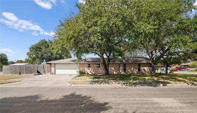 This 3-bed, 2-bath brick home sits on a large corner lot in an - photo 20