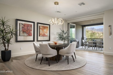 This luxury single story condominium is located in Icon at