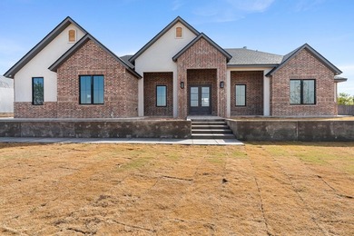 Welcome to this exceptional new-construction home tucked inside - photo 1
