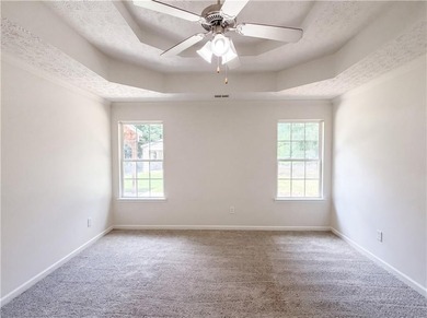 Situated on just over one acre, this well-maintained 3-bedroom - photo 11