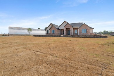 Welcome to this exceptional new-construction home tucked inside - photo 3