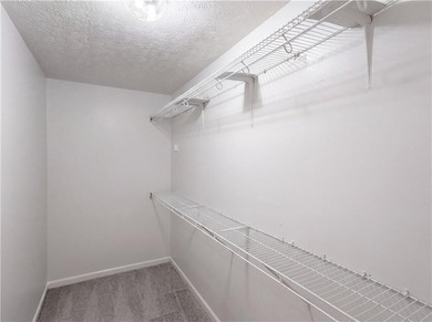 Situated on just over one acre, this well-maintained 3-bedroom - photo 18